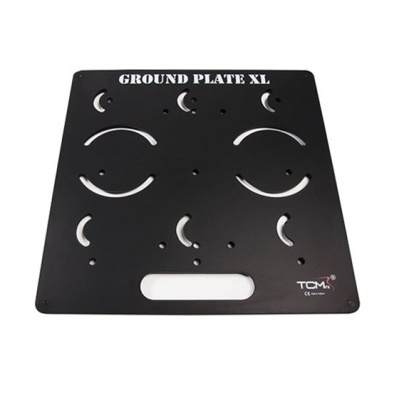 Placa metálica preta com cortes circulares e texto GROUND PLATE XL