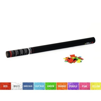 Pistola de confetis preta e pedaços de papel colorido num fundo branco