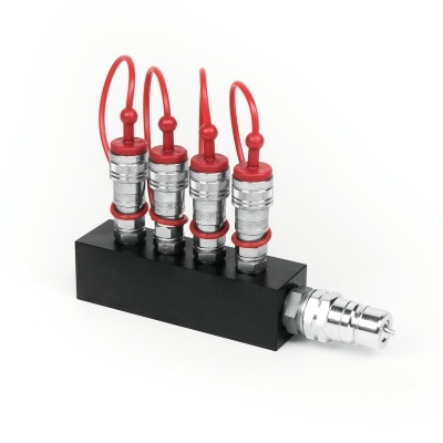 Quatro válvulas metálicas com pontas vermelhas numa base preta retangular