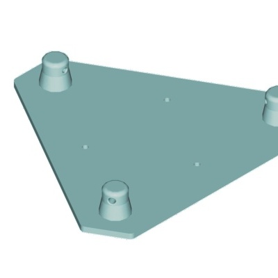 Placa triangular verde-azulada com três saliências cilíndricas