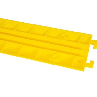 Peça plástica amarela com nervuras e entalhes para encaixe