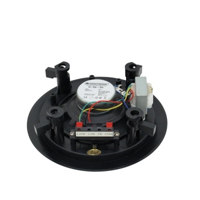 Dispositivo eletrónico redondo preto com fios e etiqueta técnica