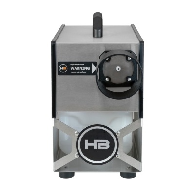 Máquina metálica cinzenta com botão preto e etiqueta WARNING de alto risco