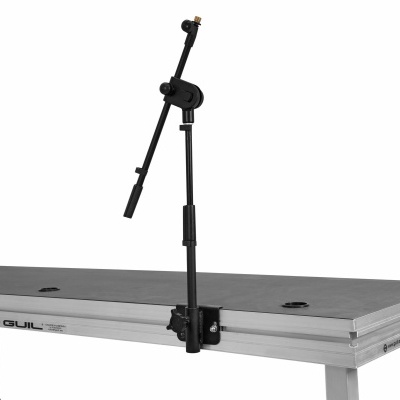 Suporte de microfone preto ajustável numa mesa cinza GUIL