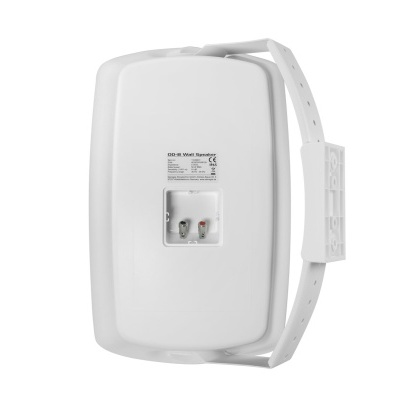 Caixa de som branca com suporte e etiquetas na parte traseira