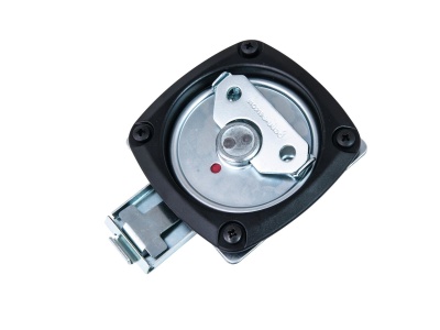 Peça metálica redonda com suporte plástico preto e parafusos visíveis