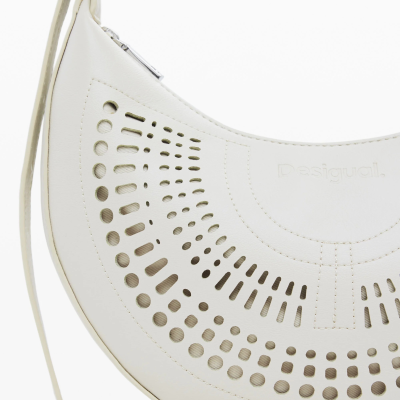 Mala branca em pele sintética com padrão de recortes circulares e logo Desigual gravado