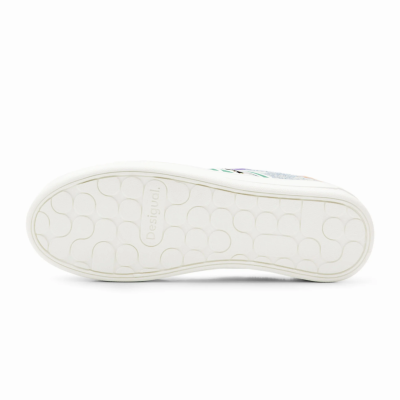 Sola de sapato branco com padrão geométrico e marca Desigual