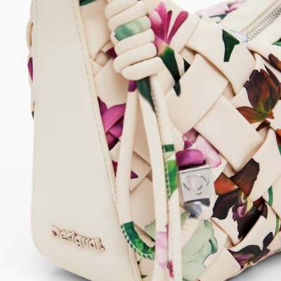 Mala de mão creme com padrão floral e detalhe trançado