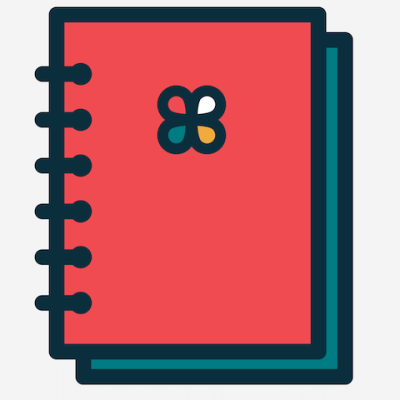 Caderno com capa vermelha e símbolo floral colorido