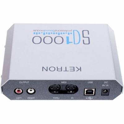 Interface de áudio KETRON SP1000 cinza com múltiplas conexões