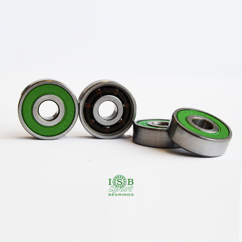 Rolamentos metálicos com anéis verdes e pretos sobre fundo branco com logotipo ISB Sport BEARINGS