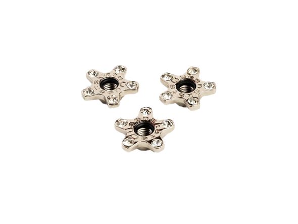 Três porcas estrela metálicas prateadas com cinco pontas e furo central