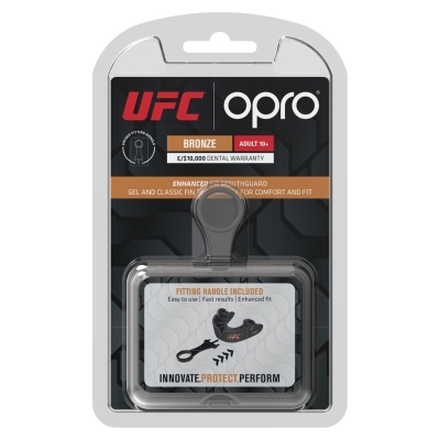 Embalagem de protetor bucal UFC OPRO Bronze com alça de ajuste e textos em inglês.