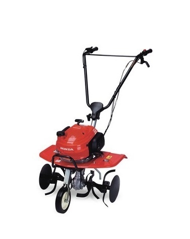 Motoenxada vermelha Honda com alças pretas e lâminas de jardinagem