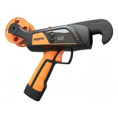 Ferramenta eletrónica preta e laranja com visor digital e disco laranja