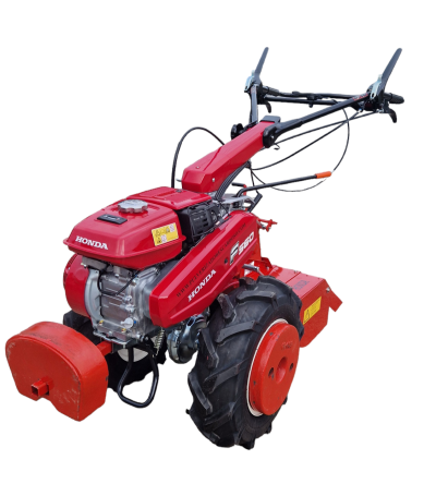 Motocultivador Honda vermelho com rodas grandes e alavancas de controlo