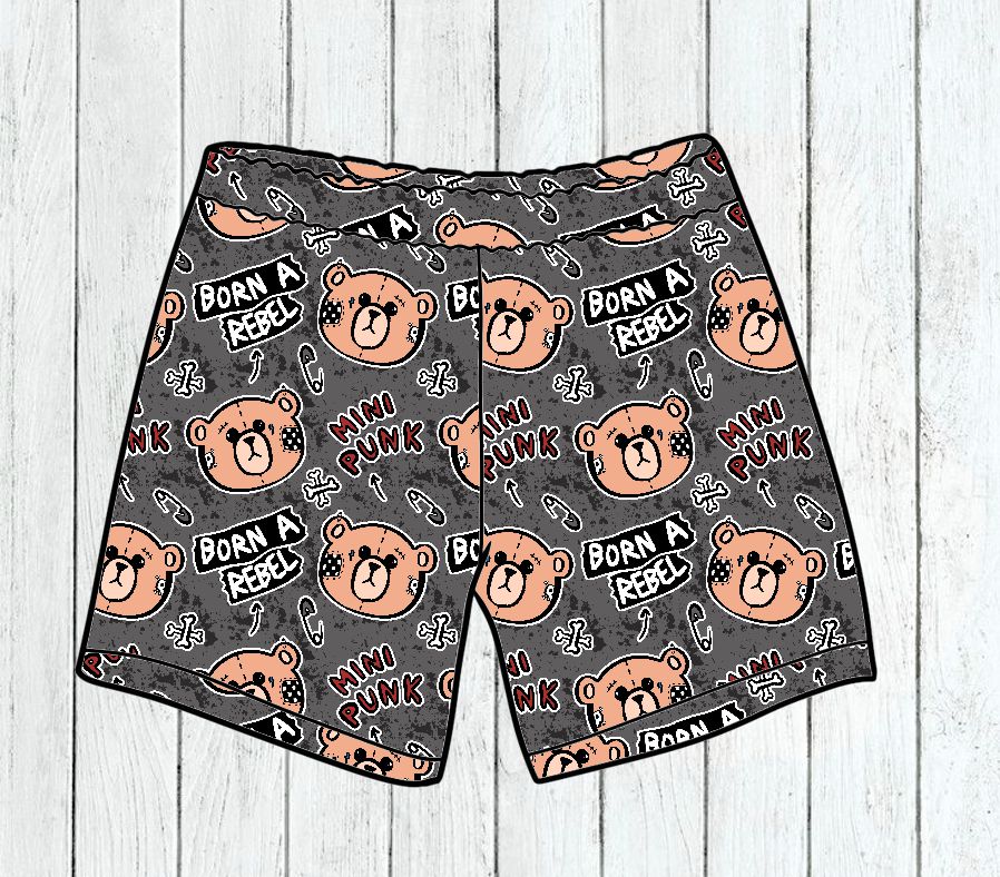 Calções cinzentos com estampado de ursos, caveiras e texto BORN A REBEL e MINI PUNK.