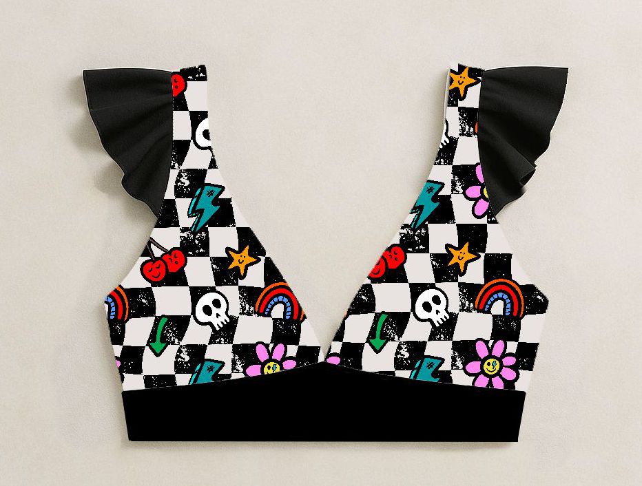 Top de desporto com padrão quadriculado colorido e detalhes em preto