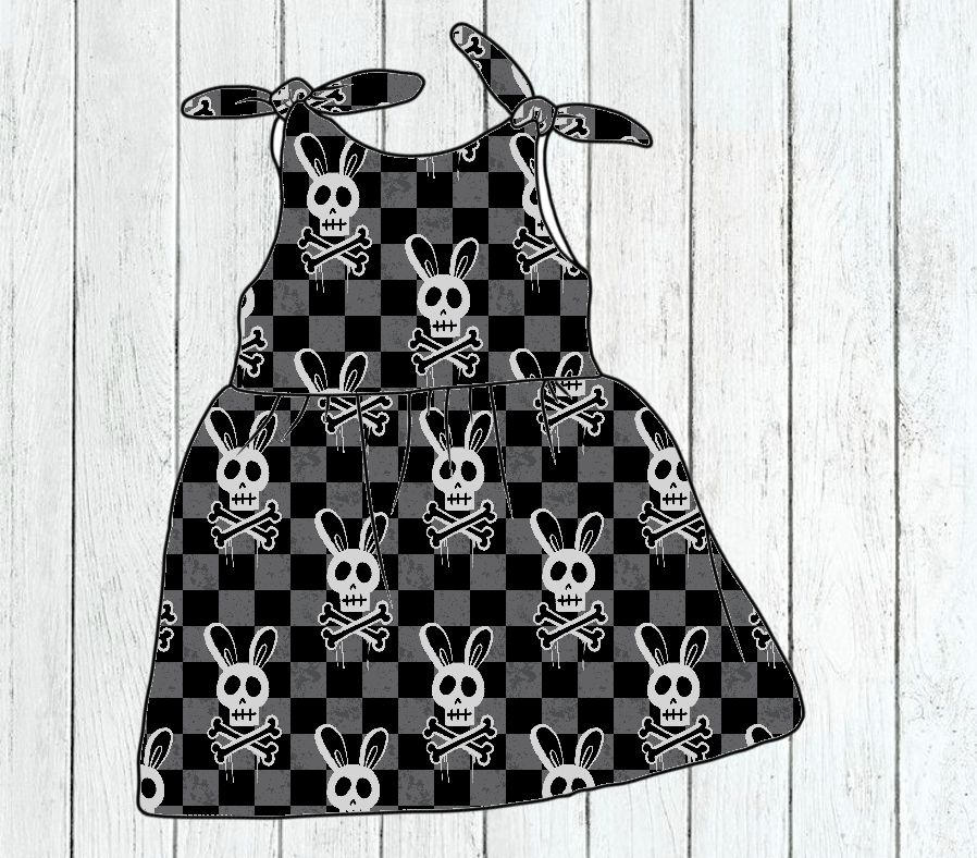 vestido infantil xadrez preto e cinza com caveira de coelho