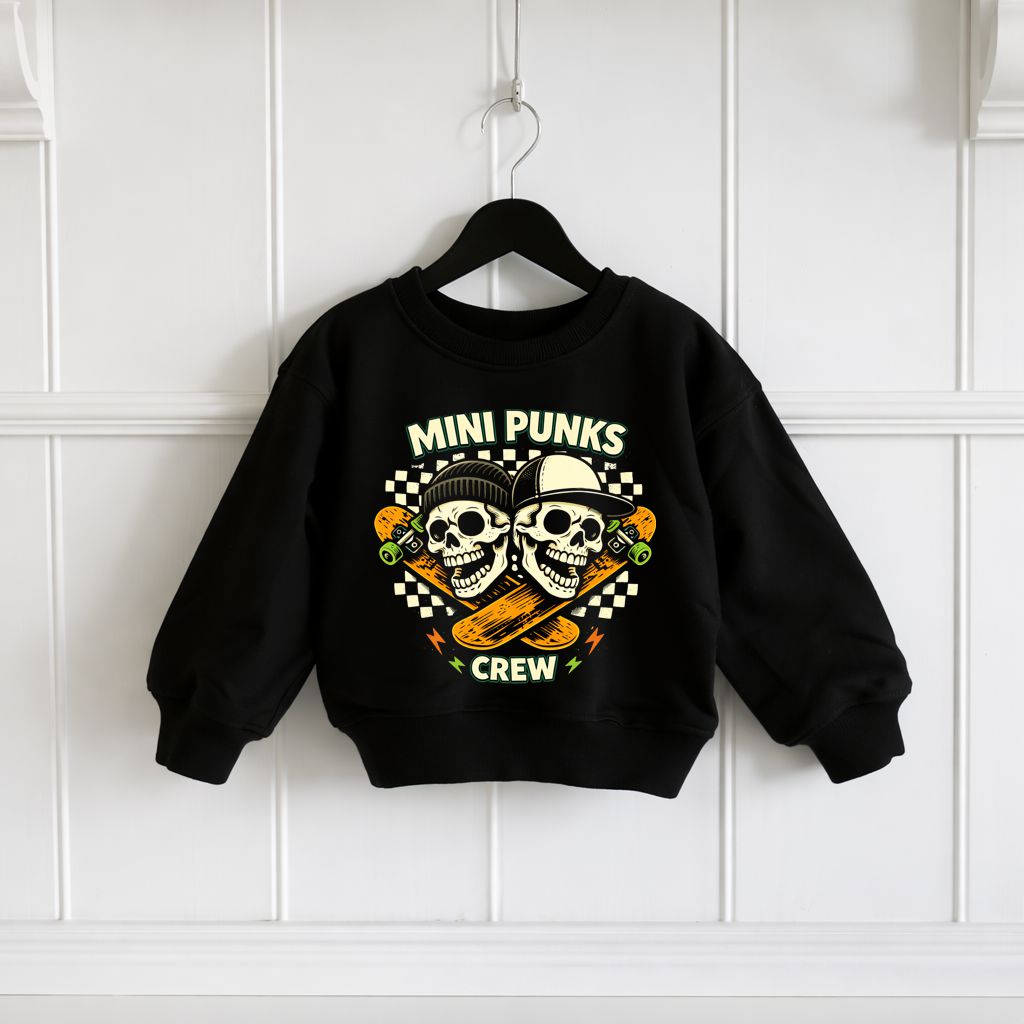 Sweatshirt preta infantil com estampa de crânios e skates