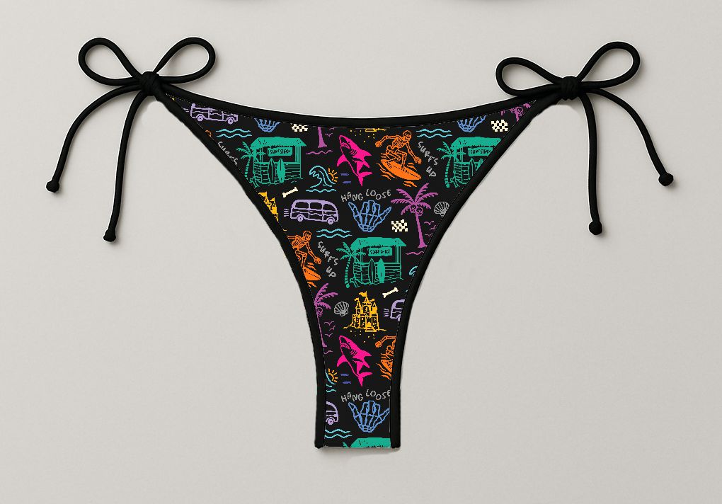 Cueca de biquíni preta com padrão colorido e tiras de amarrar nas laterais