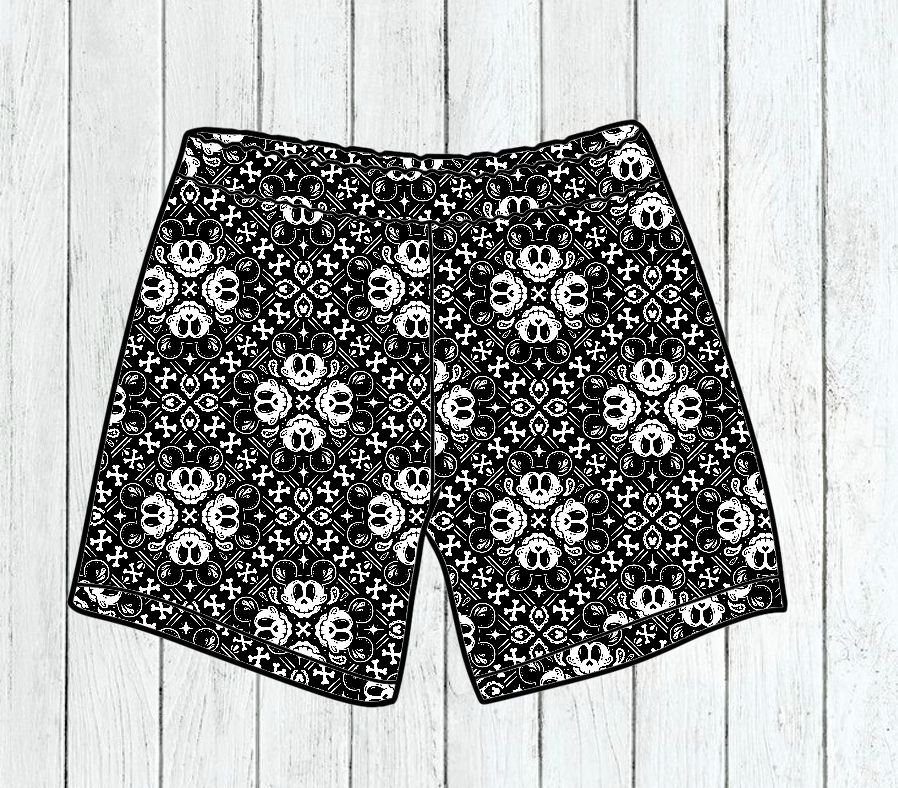 Calções em tecido com padrão preto e branco de rostos de rato e elementos geométricos