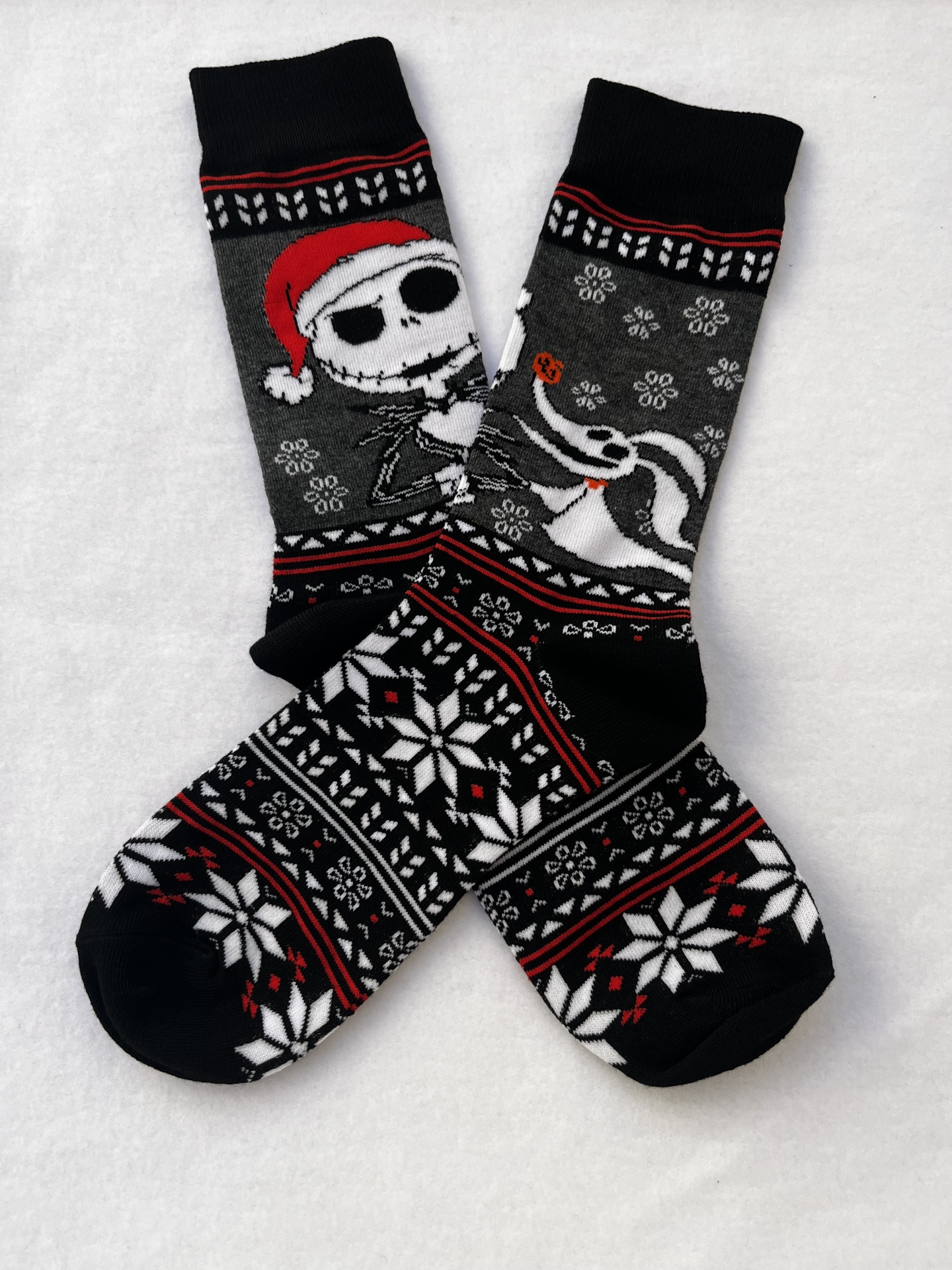 Meias natalícias com caveira e boneco de neve