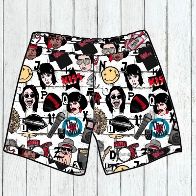 Calções de banho com padrão gráfico colorido incluindo rostos, símbolos e texto em fundo branco