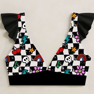 Top de desporto com padrão quadriculado colorido e detalhes em preto