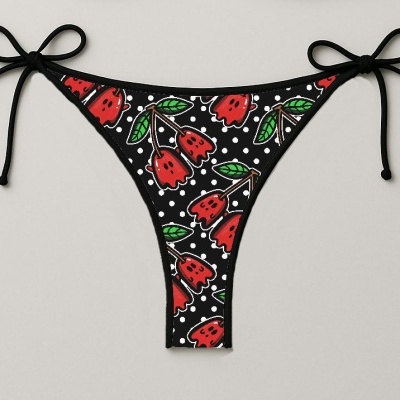 Fato de banho tanga com padrão floral preto, vermelho, verde e branco