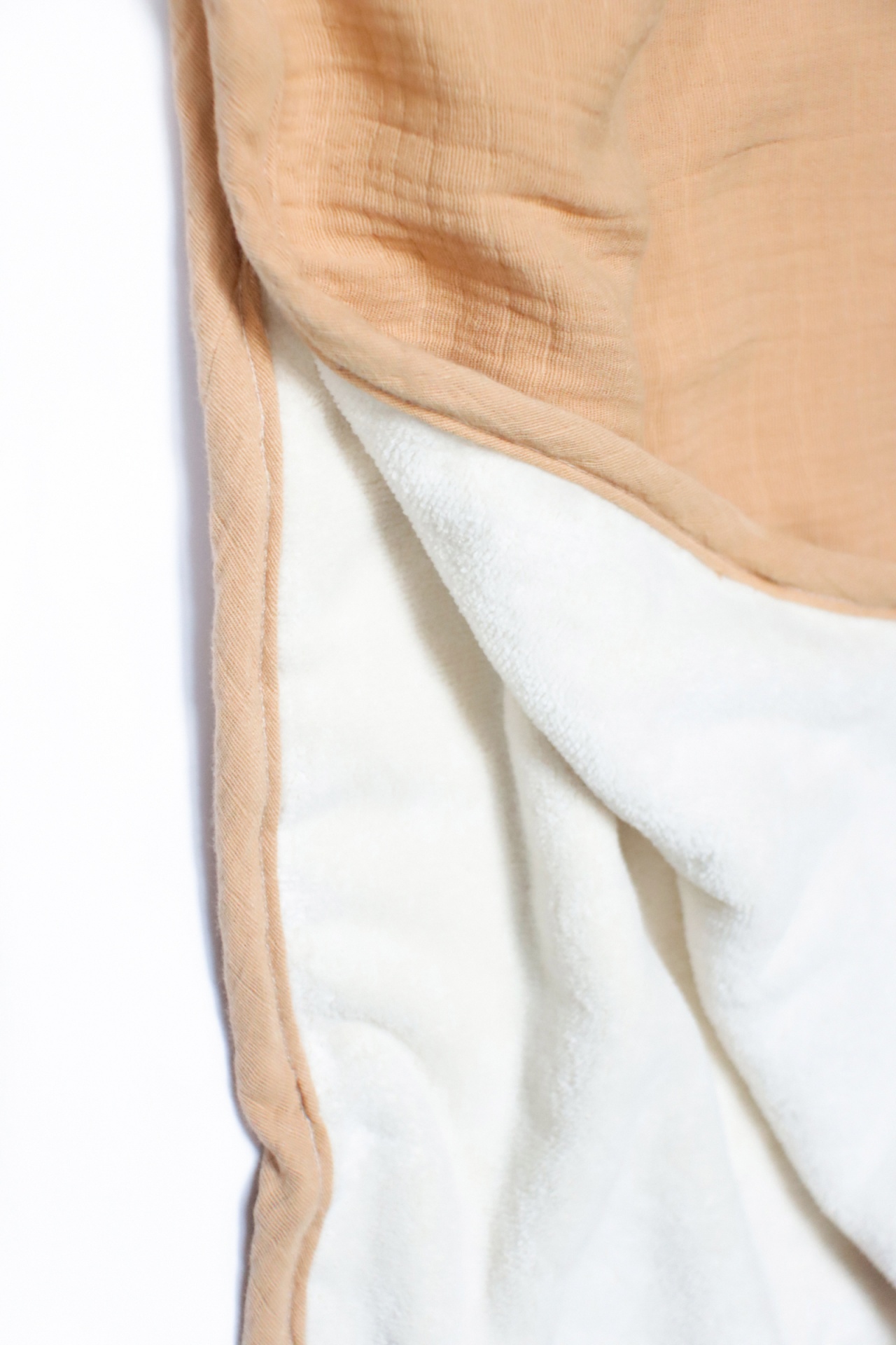 Manta bege claro com interior branco macio