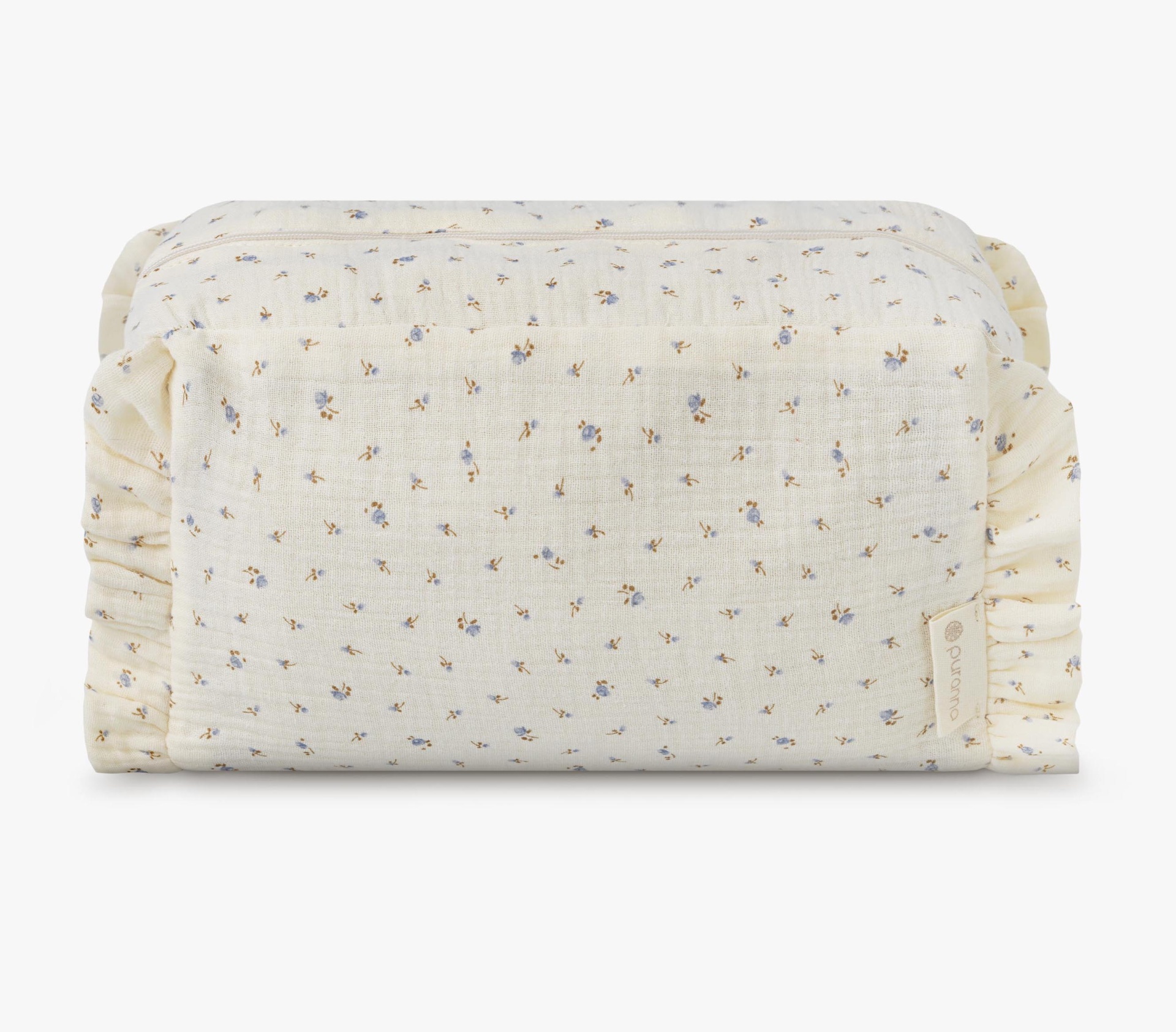 Caixa retangular almofadada em tecido creme com pequenas flores azuis e castanhas