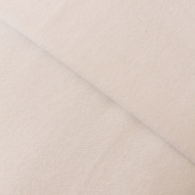 Tecido bege claro com padrão espinha de peixe sutil