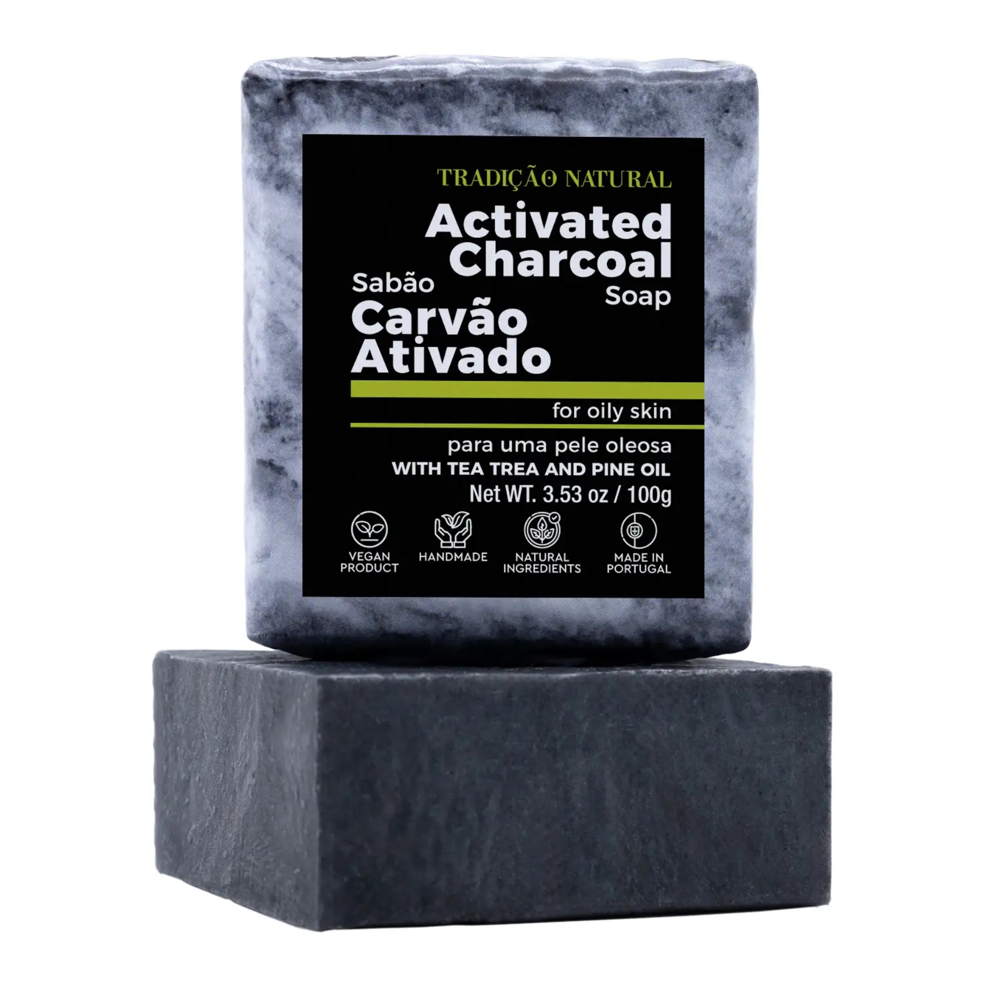 Sabão de Carvão Ativado Sabão de carvão ativado com rótulo preto e texto em branco e verde, sobre base preta.
