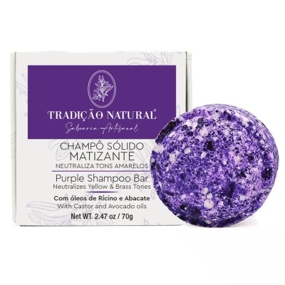 Champô sólido roxo com manchas brancas e embalagem branca com rótulo roxo da TRADIÇÃO NATURAL