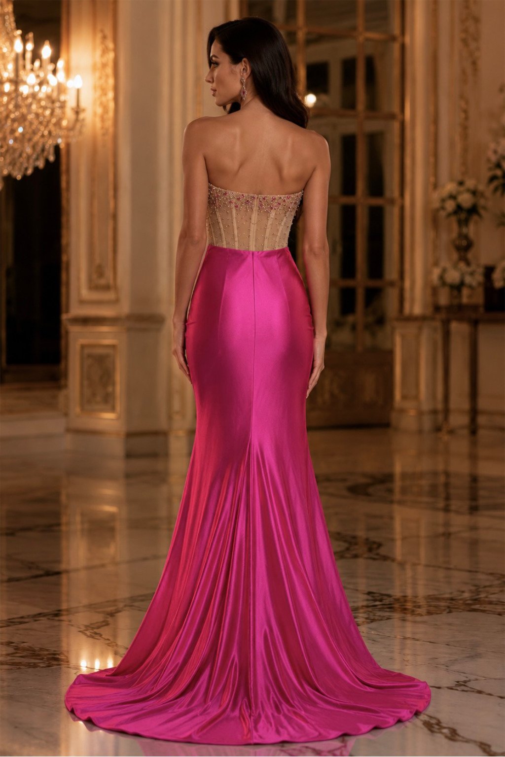 Vestido Santorini Vestido longo rosa com corpete transparente e saia de cetim em ambiente luxuoso