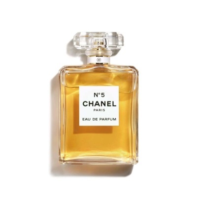 Frasco de perfume Chanel N° 5 Paris em vidro transparente com líquido âmbar