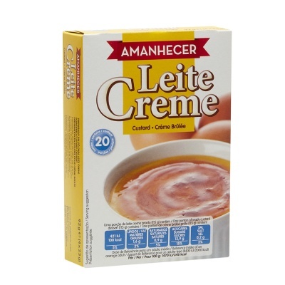 Embalagem de Leite Creme Amanhecer, amarelo e branco, com imagem de creme brûlée