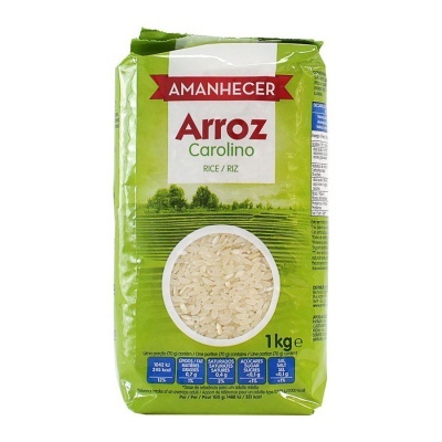 Pacote verde de arroz Carolino Amanhecer 1 kg com texto e informações nutricionais.