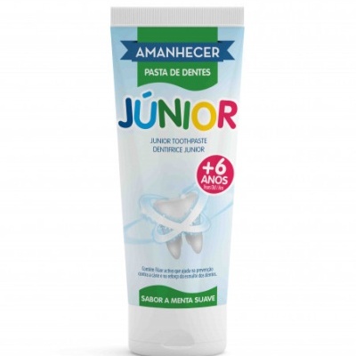 Tubo de pasta de dentes Amanhecer Júnior para crianças com imagem de dente e texto colorido