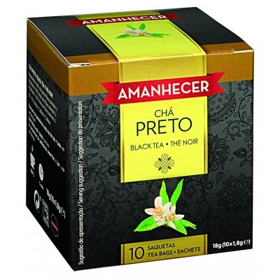 Caixa de chá preto Amanhecer com detalhes florais e texto em três idiomas