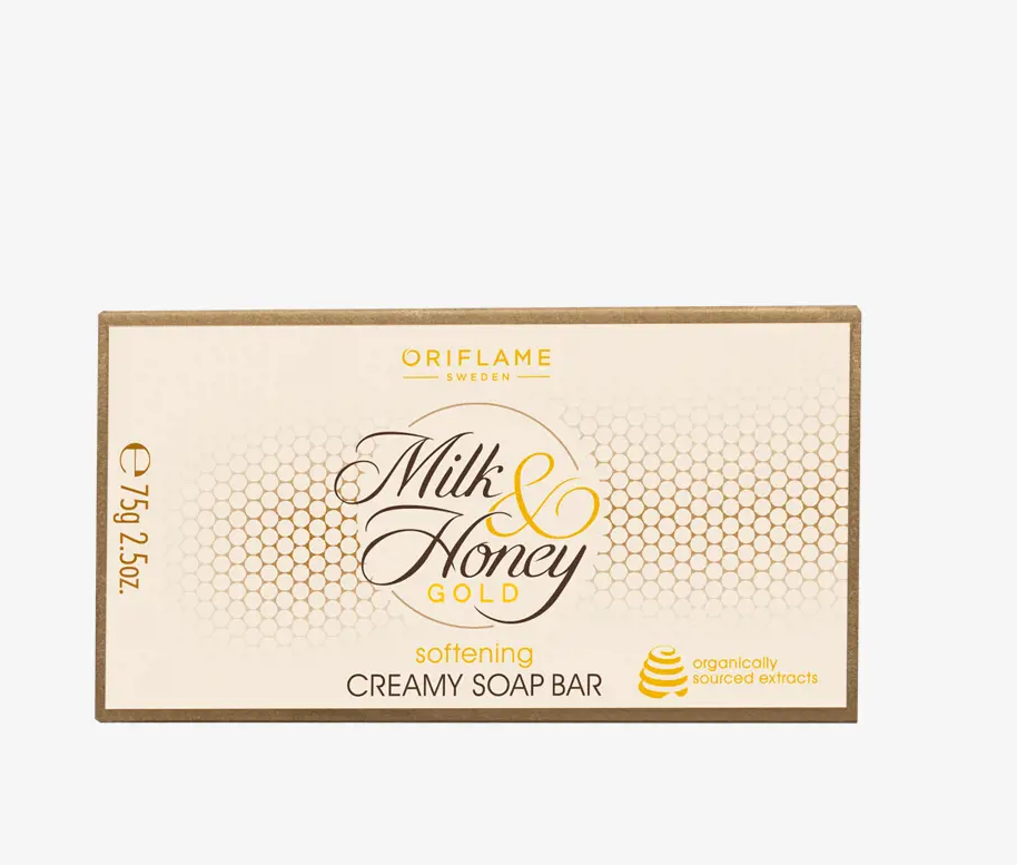 31604 Sabonete Suavizante Milk & Honey Gold Embalagem de sabonete cremoso Milk & Honey Gold da Oriflame com design branco e dourado.