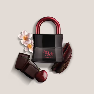 Frasco de perfume her code O BOTICÁRIO em forma de cadeado com elementos decorativos