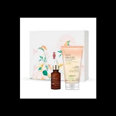 Conjunto de produtos de cuidados de pele embalados com motivos florais, garrafa castanha e tubo bege.