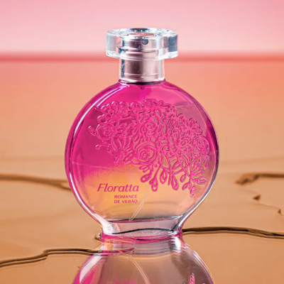 Frasco redondo de perfume Floratta Romance de Verão com padrão floral e tampa transparente