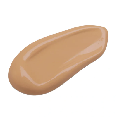 Pingo de creme ou base líquida bege sobre fundo branco