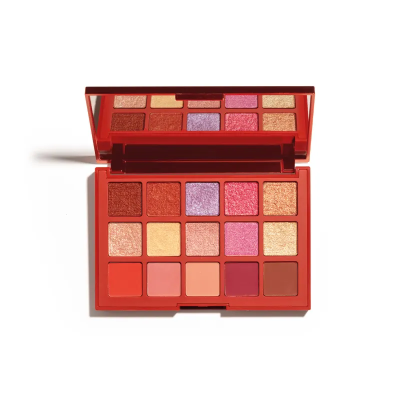 Paleta de sombras coloridas com espelho na tampa.