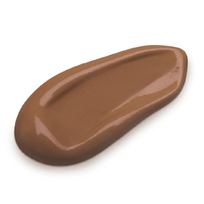 Gota de creme líquido castanho claro com brilho