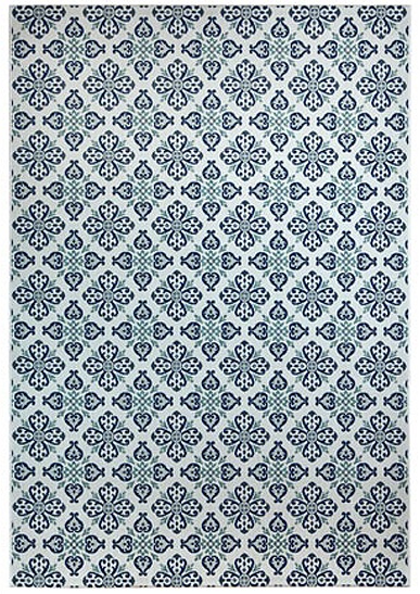 Tapete azul e branco com padrão floral repetitivo